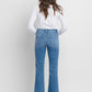 HIGH RISE TROUSER HEM RELAXED FLARE JEANS